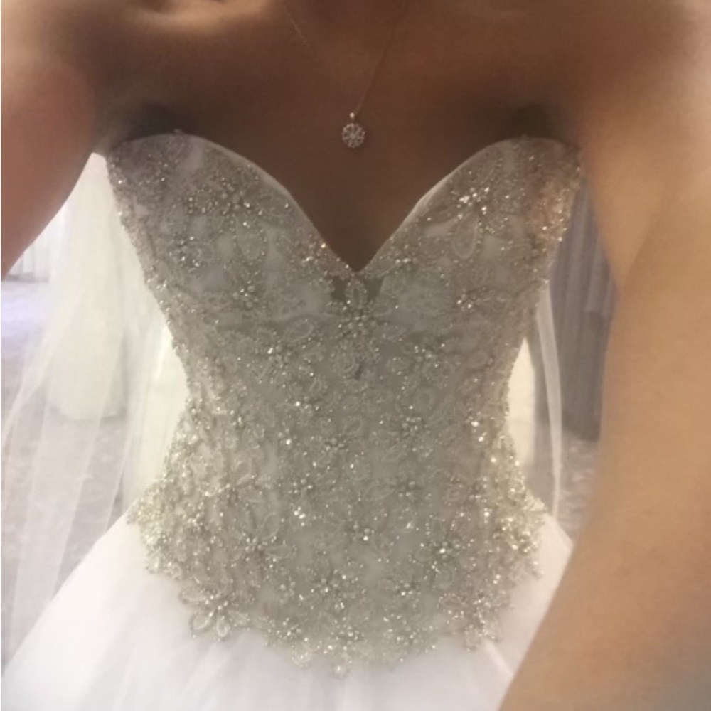 This dress is new with tags. It is a  size 10. I paid $2,400.